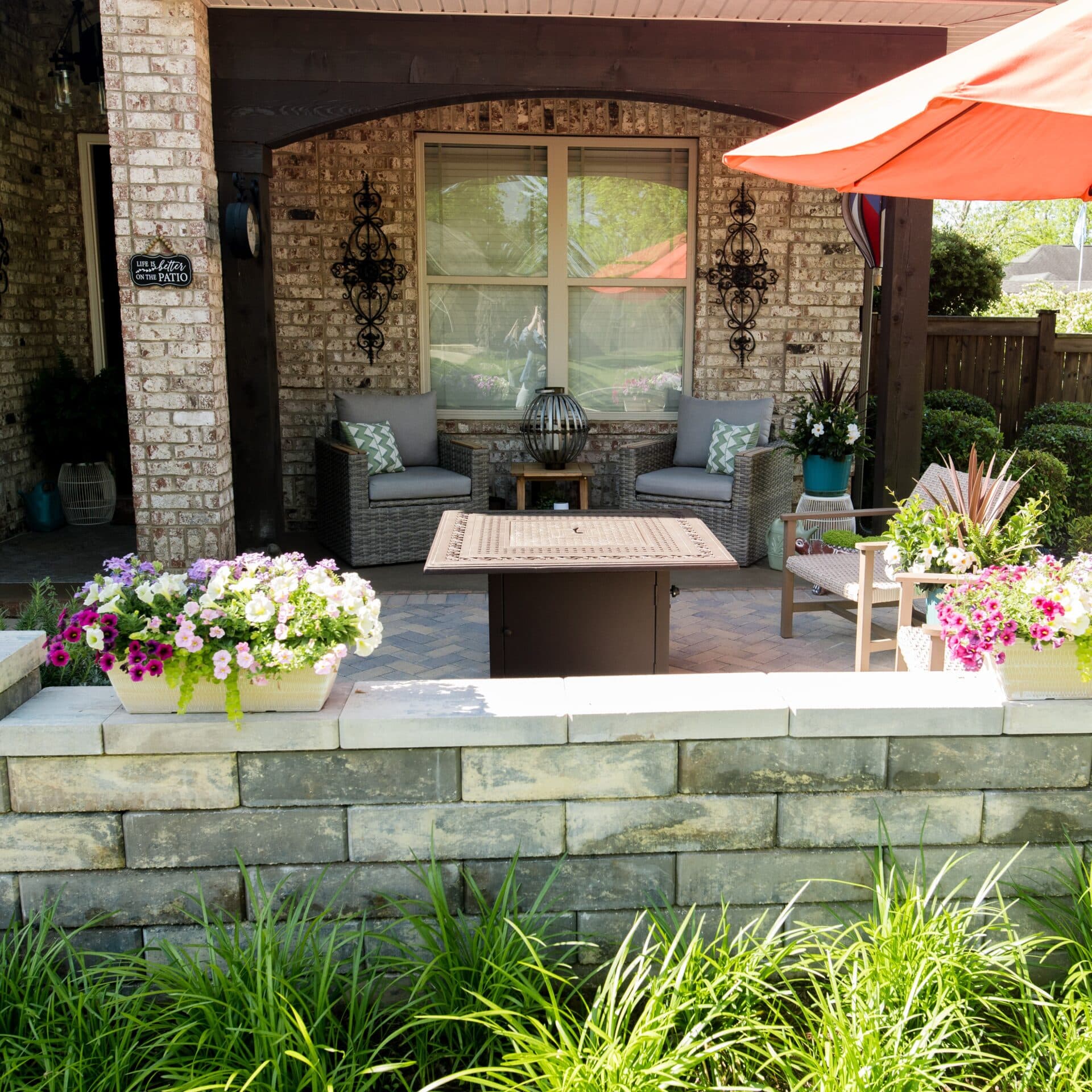 outdoor sitting area on a back stone patio