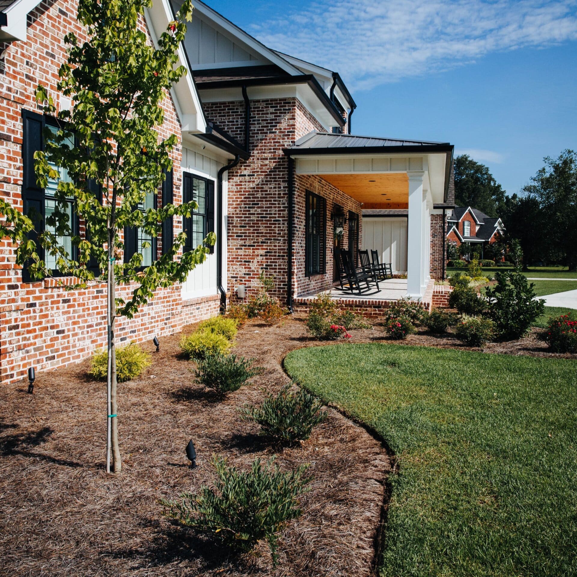 flower bed with pine straw